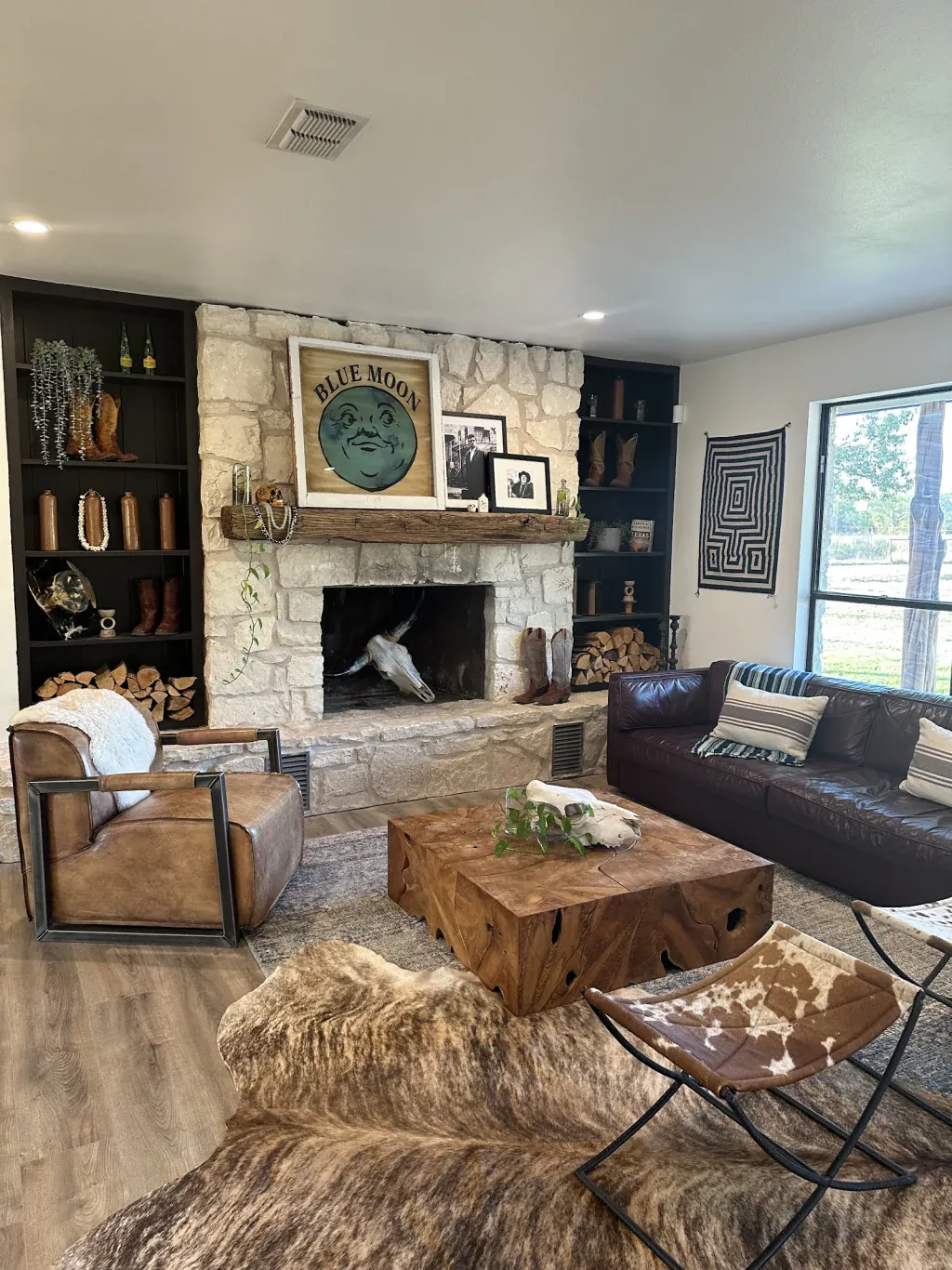 The Lodge lounge with a stone fireplace and seating